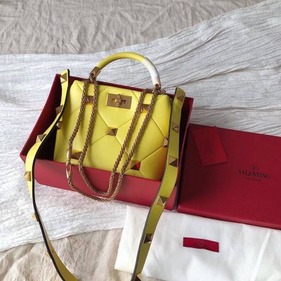 Valentino Small Roman Stud Top Handle Bag In Yellow Nappa IAMBS242889